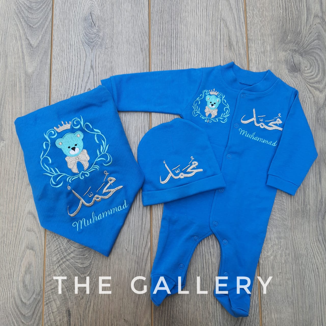 Wrapping sheet and romper with cap